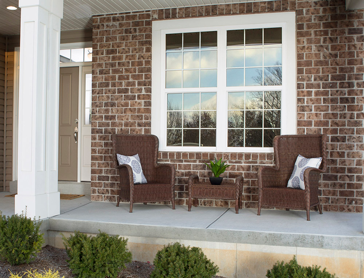 Front windows of home treated with Gila window tint